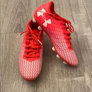 Under Armour, 1Y, soccer cleats. Orange/white.